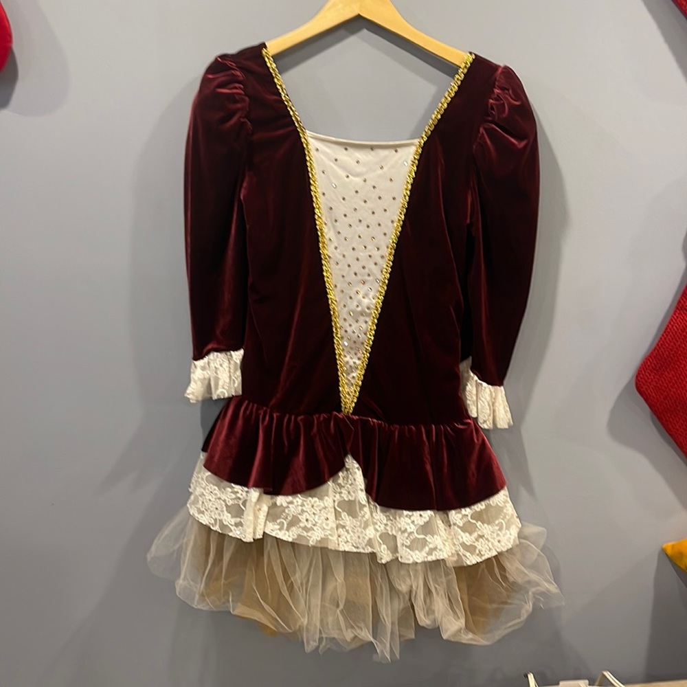Burgundy velvet dance dress with gold swarovski crystals on front and skirt.